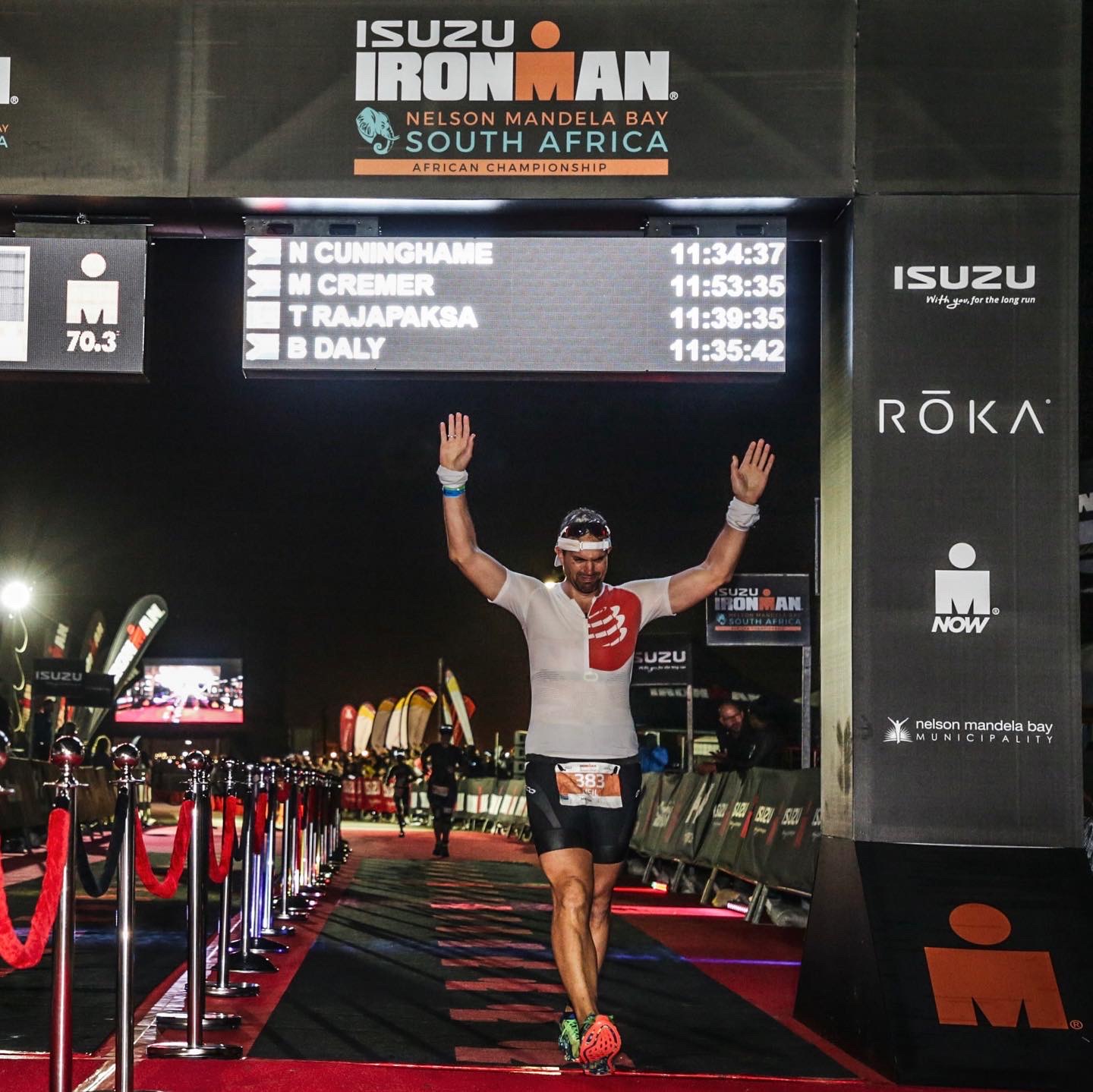 Dr Neil Cuninghame finishing the full-distance Ironman African Championship in 2022