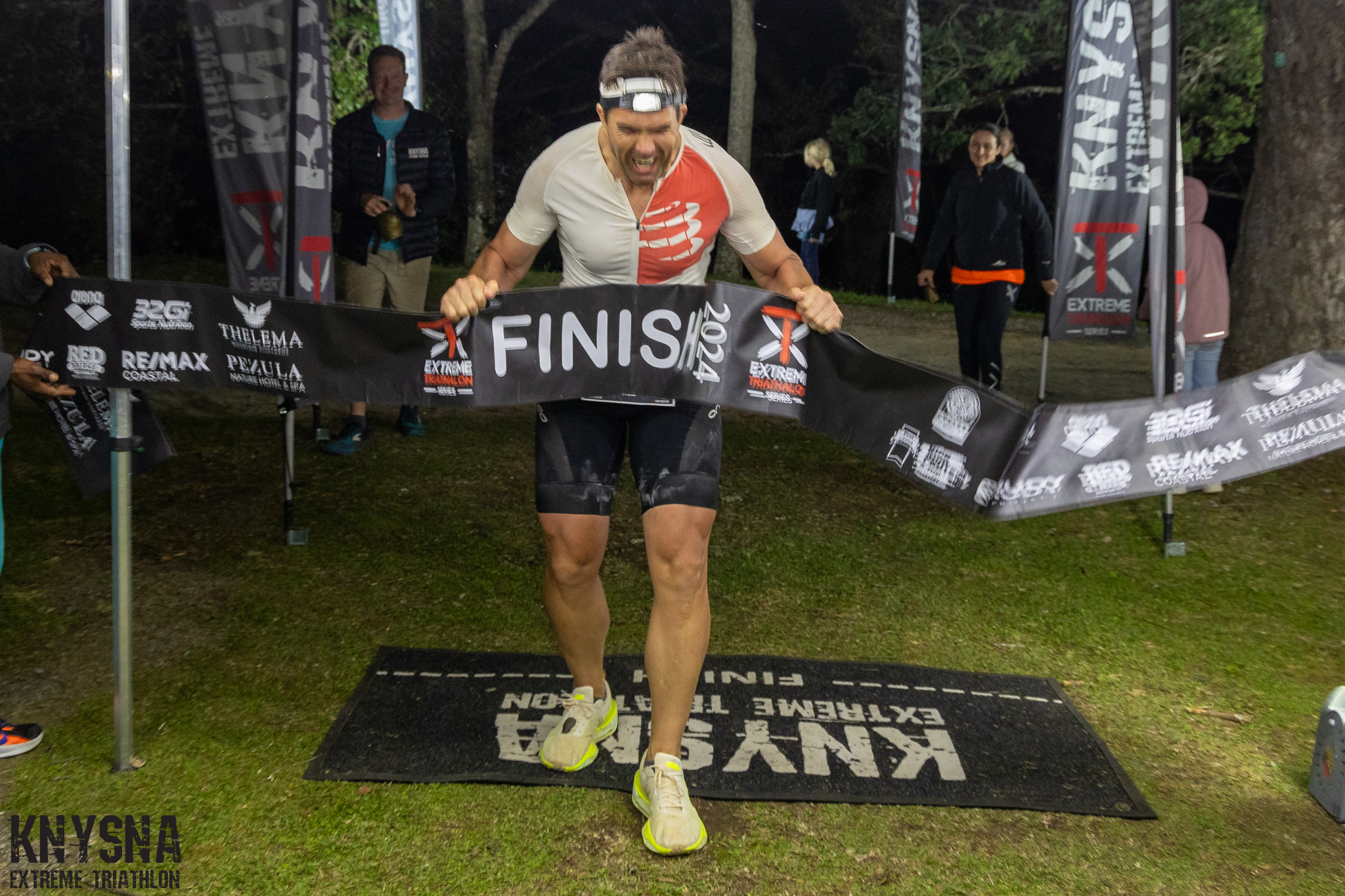 Dr Neil Cuninghame finishing the Knysna Extreme Triathlon in 2024